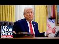 Trump takes questions after signing executive orders