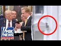 Trump reacts to viral video showing mystery items tossed from White House window