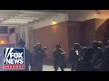 WATCH: Protesters and police clash in Portland