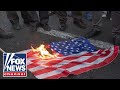 ‘DISGUSTING’: GOP lawmaker slams anti-Trump activists for burning US flags on July 4