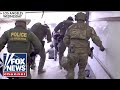 WATCH: CBP agents burst from rental truck at Home Depot; 16 arrests