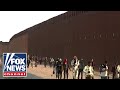 Wild videos emerge as border crossings smash records