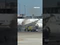 WATCH: Ramp truck at Dulles International Airport catches fire #shorts #dulles #fire #usa