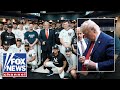 Trump meets with New York Yankees in clubhouse on 9/11 anniversary