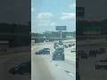 Wild moment caught on cam of a car being towed with only a chain swerves out of control on a freeway