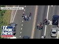 MANHUNT UNDERWAY after ICE agent struck, gunfire erupts: Report