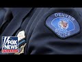 Denver slashing police budget to address migrant crisis