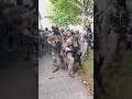 WATCH: Federal agents deploy tear gas during a tense standoff with a 'hostile' crowd #shorts #usa