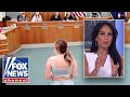 Parents publicly UNDRESS to protest locker room policy: 'YOU FEEL UNCOMFORTABLE, HUH?'