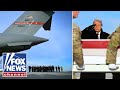 Solemn Salute: Trump attends dignified transfer of fallen US soldiers and interpreter