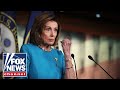 Democrats' 'civil war' escalates as Pelosi announces re-election plan