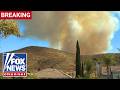 BREAKING: Evacuations underway as fast-moving wildfire breaks out in Southern California