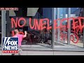 BREAKING: Tesla vandals deface NYC dealership