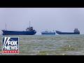 NEW audio reveals Iranian military THREATENING ships in Hormuz
