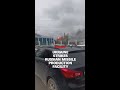 Smoke billows after Ukrainian drone strike in Russia