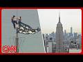 2 protestors climb Empire State Building for apparent proposal