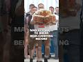 Man attempts to break beer-carrying record