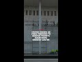 Crowd cheers as crew prepares to remove Trump's name from Kennedy Center