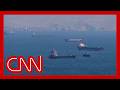 Iran fires on tanker & container ship; Hormuz closed again