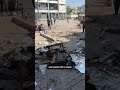 Child flees Israeli strike on Gaza refugee camp