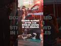 At least 30 injured after vehicle strikes crowd in Los Angeles