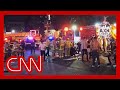 At least 30 hurt after vehicle strikes LA crowd. The driver was then shot by bystander, police say.