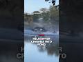 Helicopter crashes into pond