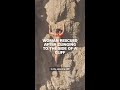 Woman rescued after clinging to the side of a cliff