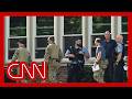 Neighbor rushed to scene of school shooting and stayed with injured kids until ambulance arrived
