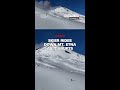 Skier rides down Mt. Etna as it erupts
