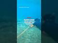 Filipino diver cuts China’s floating barrier